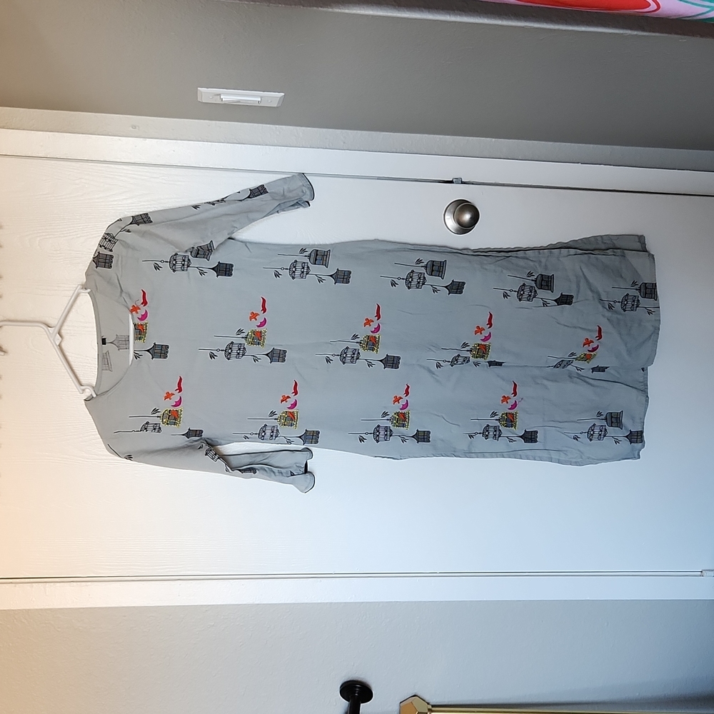 Cage Print with embroidery doves tunic slides on sides fits Xs /S